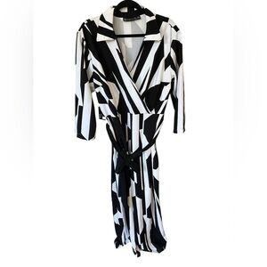 New York & Company Black and White Striped jumpsuit size XL